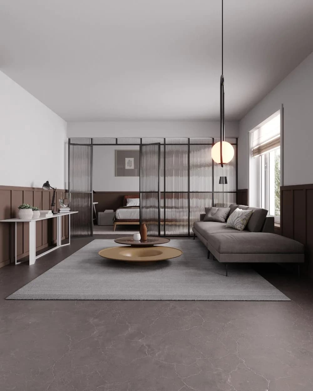 Render de sala integrada ao quarto por uma divisória de vidro canelado, com sofá cinza e luminária pendente.
